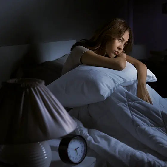 Woman awake in bed at 3am