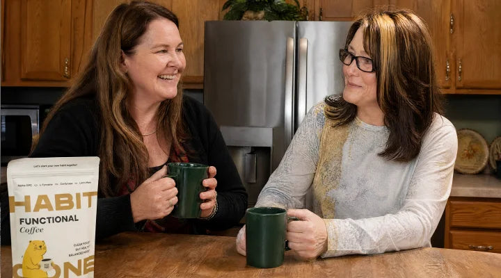 Two women talking over HabitONE coffee